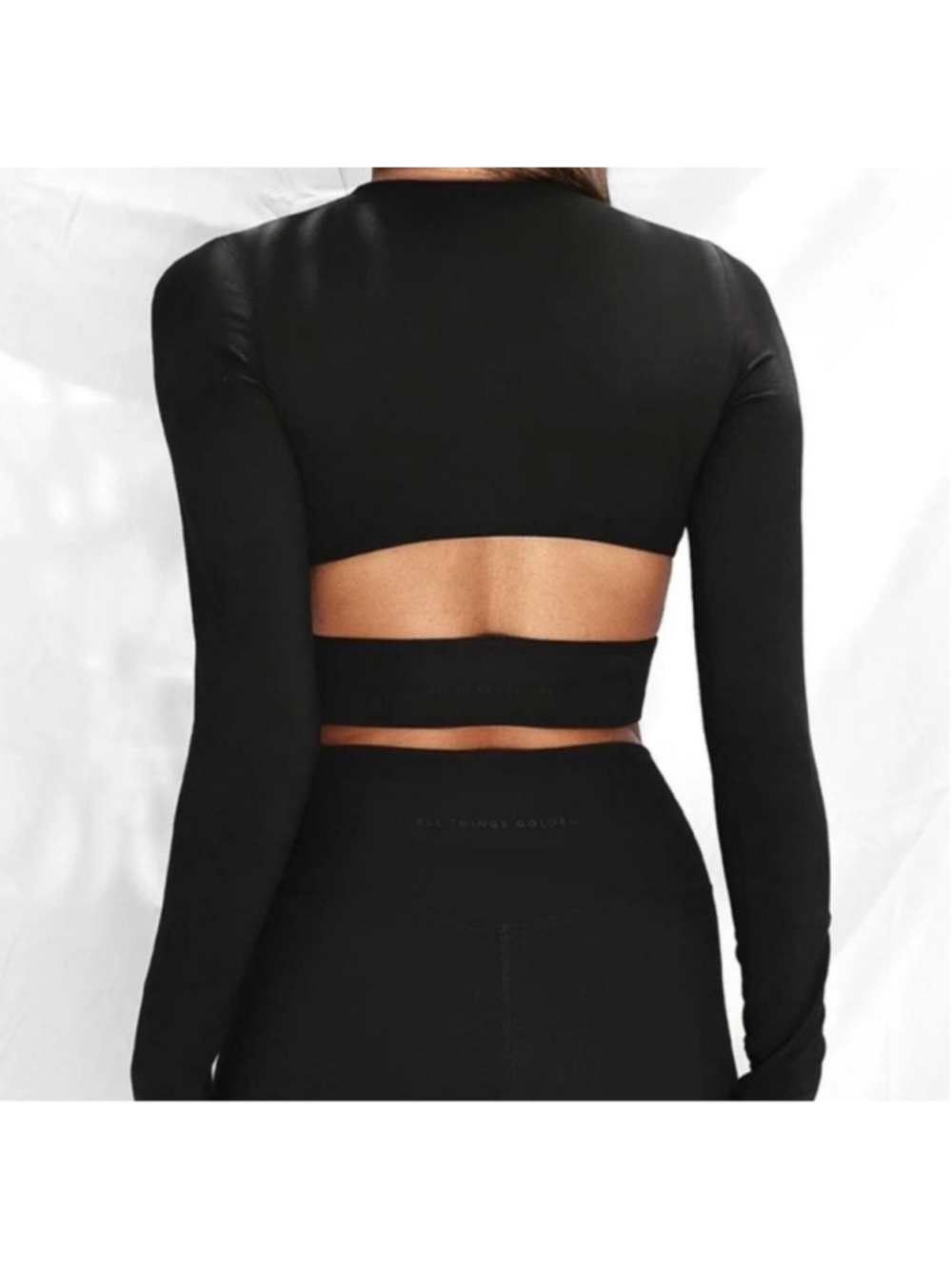 All Things Golden Sculpt Cutout Long Sleeve Top in Black sz S